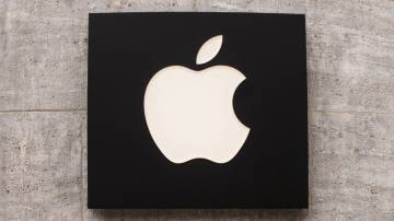 Logo da Apple fixado em uma parde