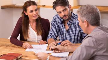 Couple meeting financial advisor