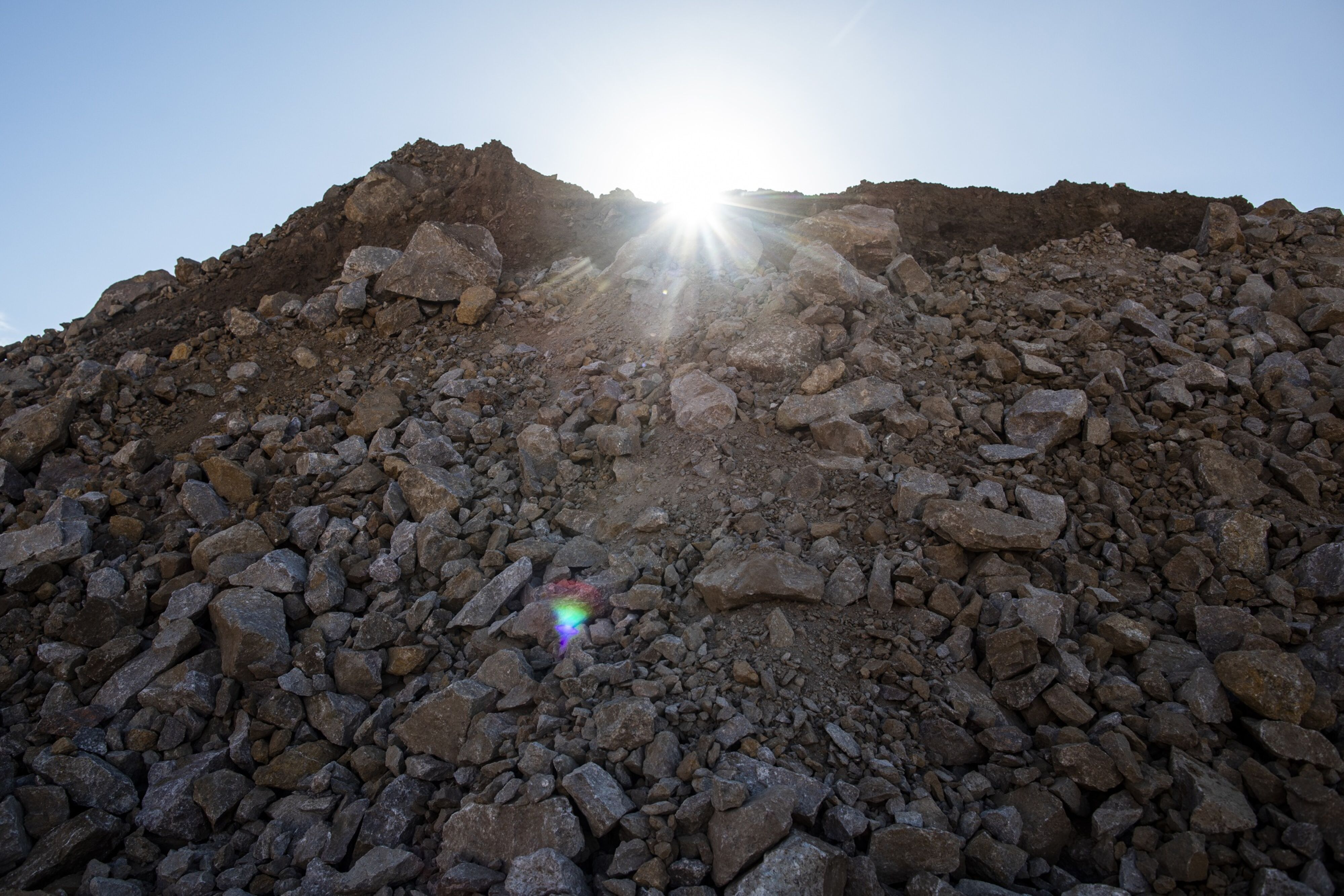 Raw ore at an open-pit mine in California.