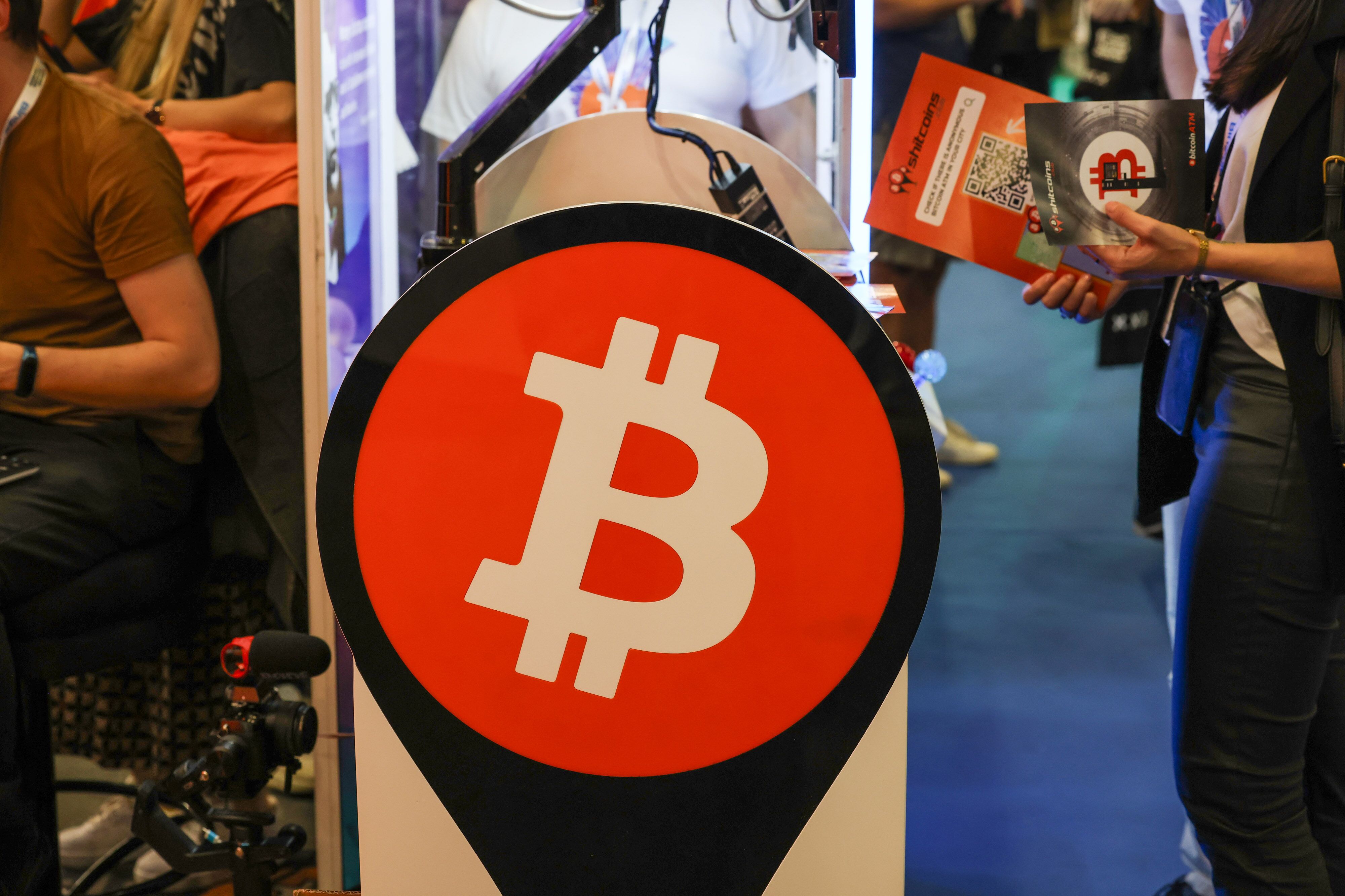 A Bitcoin sign on the opening day of the European Blockchain Convention at the Fira de Barcelona in Barcelona, Spain, on Wednesday, Oct. 25, 2023. Europe's largest blockchain event runs from 25-26 Oct. Photographer: Angel Garcia/Bloomberg