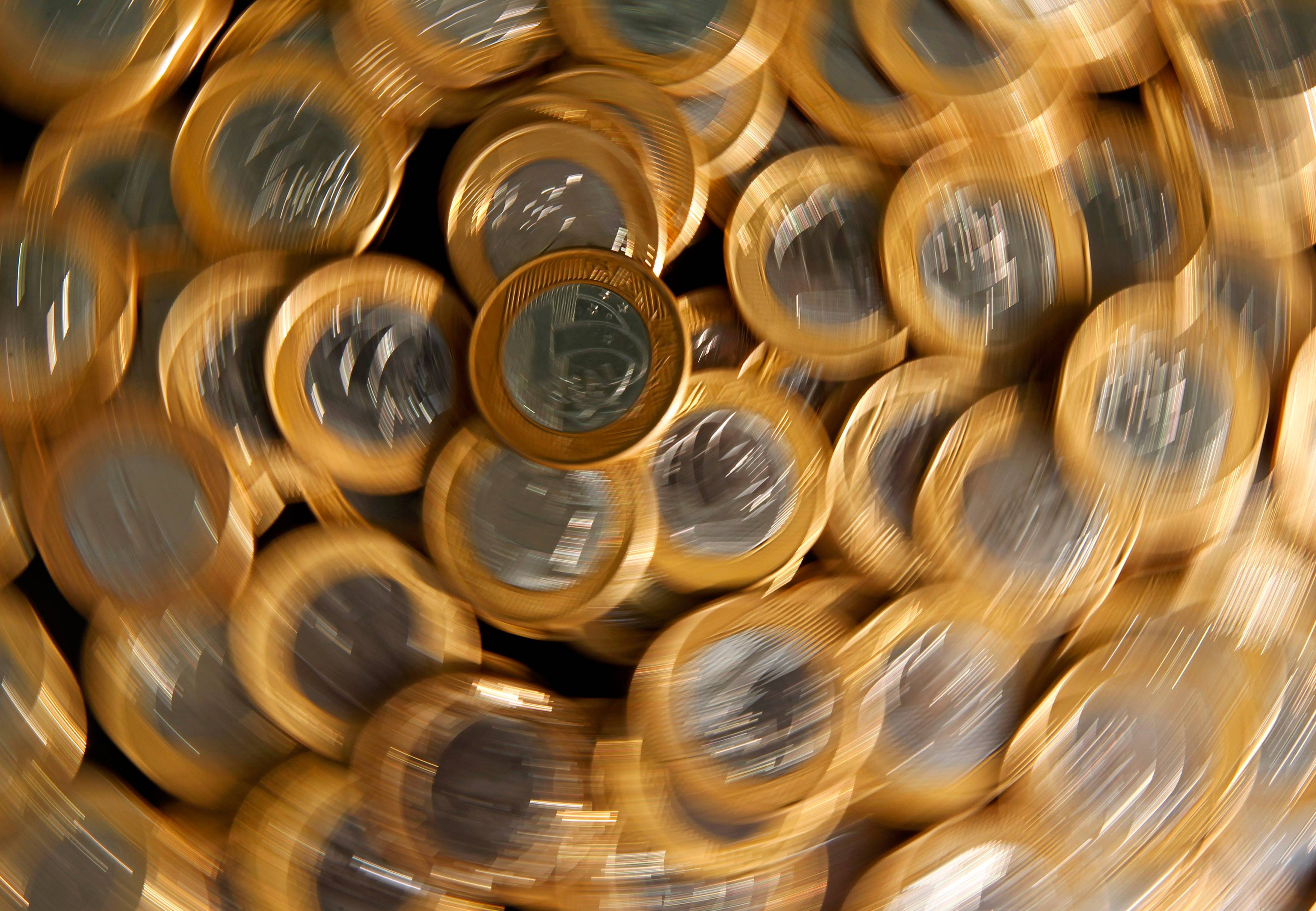 Moedas de 1 real 15/10/2010 REUTERS/Bruno Domingos