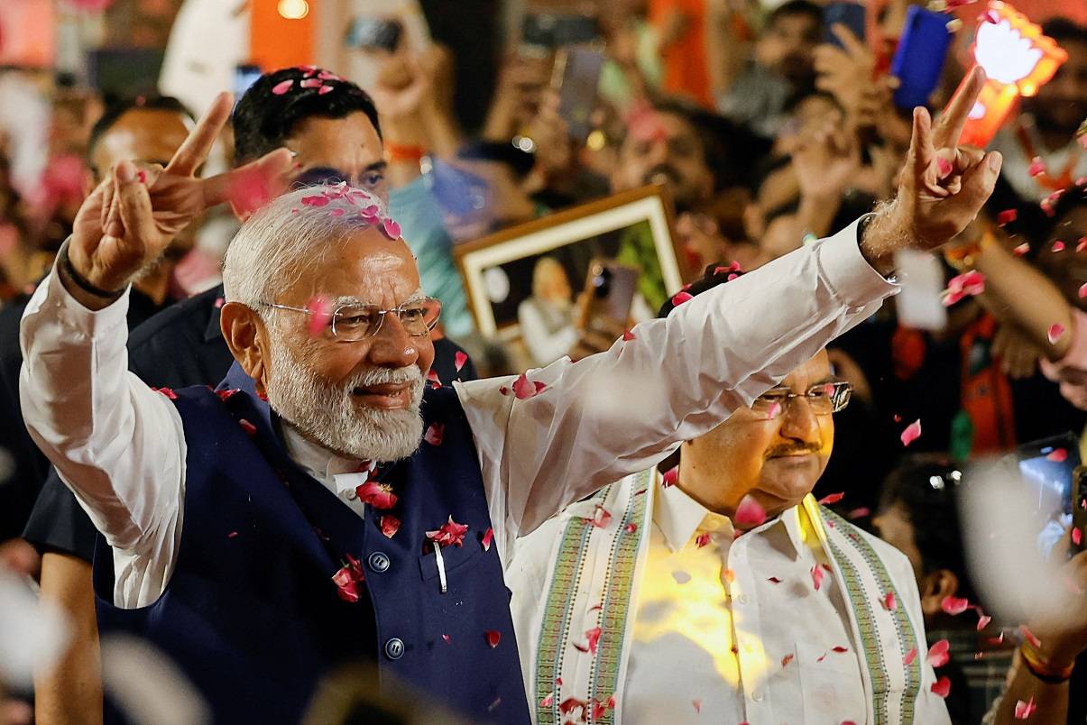 Modi acena a apoiadores em Nova Délhi
 4/6/2024   REUTERS/Adnan Abidi