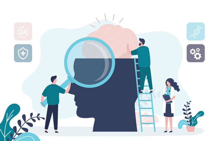 Conceito de tratamento de cuidados de saúde mental. Médico especialista trabalha para ministrar terapia psicológica. Pessoas pequenas, trabalho em equipe. Personagens engraçados em estilo moderno. (Crédito: Getty Images)