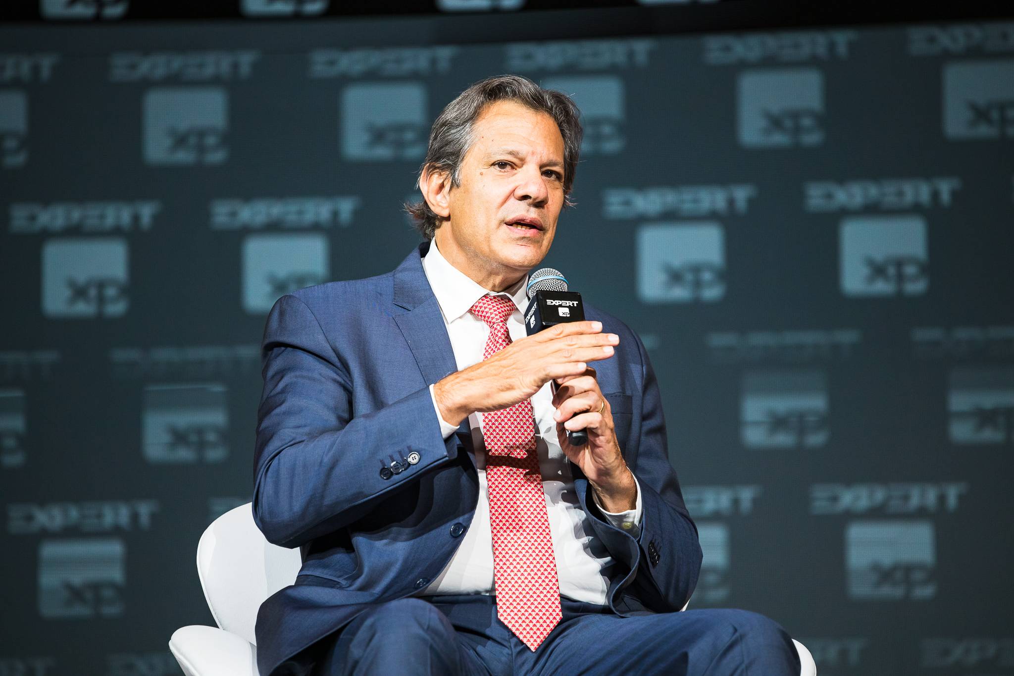 O ministro da Fazenda, Fernando Haddad (PT), durante painel sobre cenário fiscal pela Expert XP 2024 (Foto: Divulgação/Expert XP)