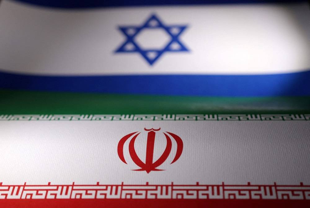 Bandeiras de Israel e do Irã em foto de ilustração
24/04/2024 REUTERS/Dado Ruvic