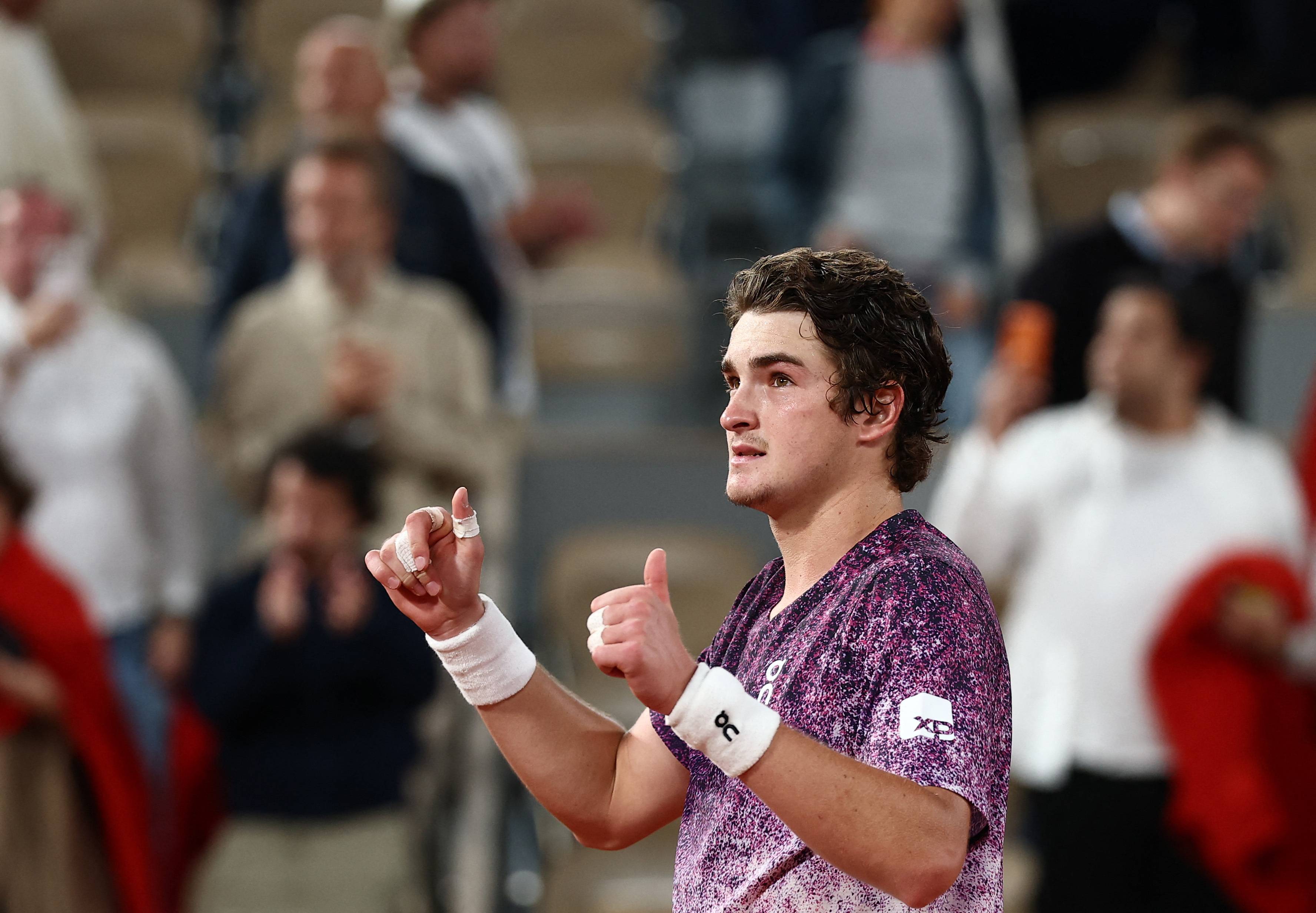 Tennis - French Open - Roland Garros, Paris, France - May 31, 2026 Brazil's Joao Fonseca celebrates after winning his fourth round match against Norway's Casper Ruud REUTERS/Guglielmo Mangiapane