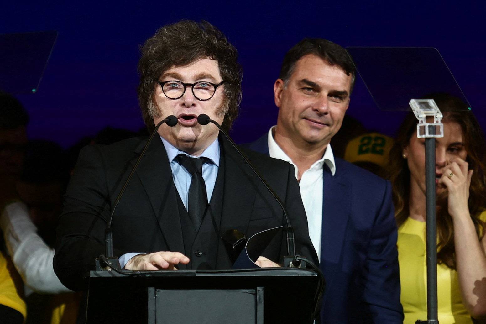 Argentine President Javier Milei speaks next to Brazilian Senator Flavio Bolsonaro, who is to be announced as candidate for Brazil's presidential elections, during the national convention of the Liberal Party (PL) in Sao Paulo, Brazil, July 25, 2026. REUTERS/Jean Carniel